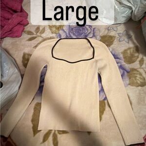 Cream Long Sleeve Sweater with Black Trim each one $10